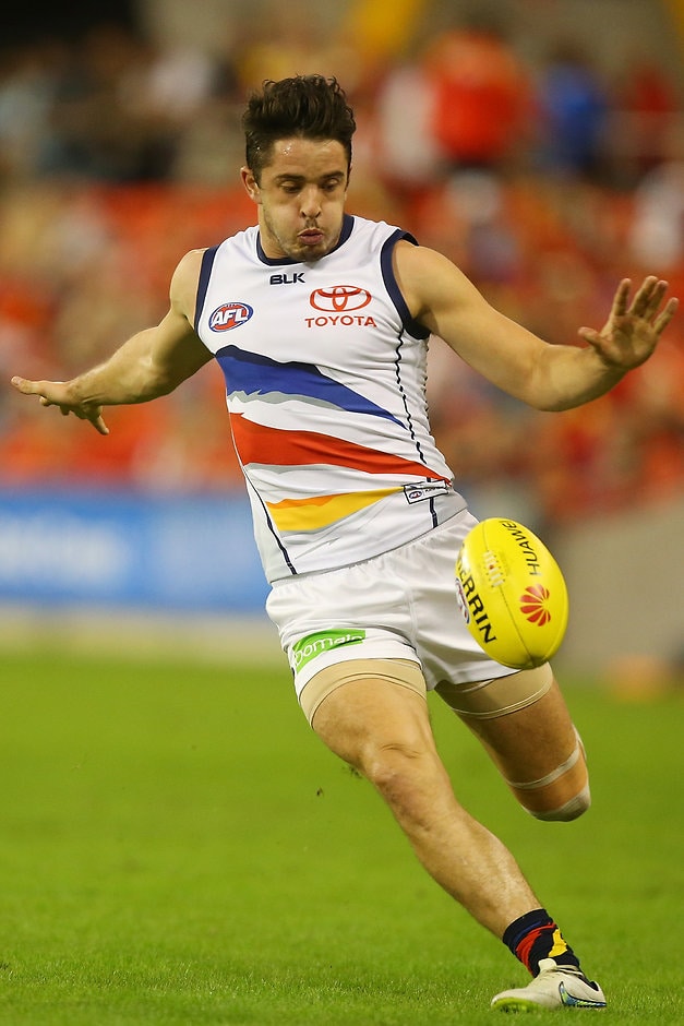 AFL 2015 Rd 06 - Gold Coast v Adelaide GOLD COAST, AUSTRALIA - MAY 09: Matthew Jaensch of the Crows kicks during the round six AFL match between the Gold Coast Suns and the Adelaide Crows at Metricon Stadium on May 9, 2015 in Gold Coast, Australia. (Photo by Chris Hyde/Getty Images)
